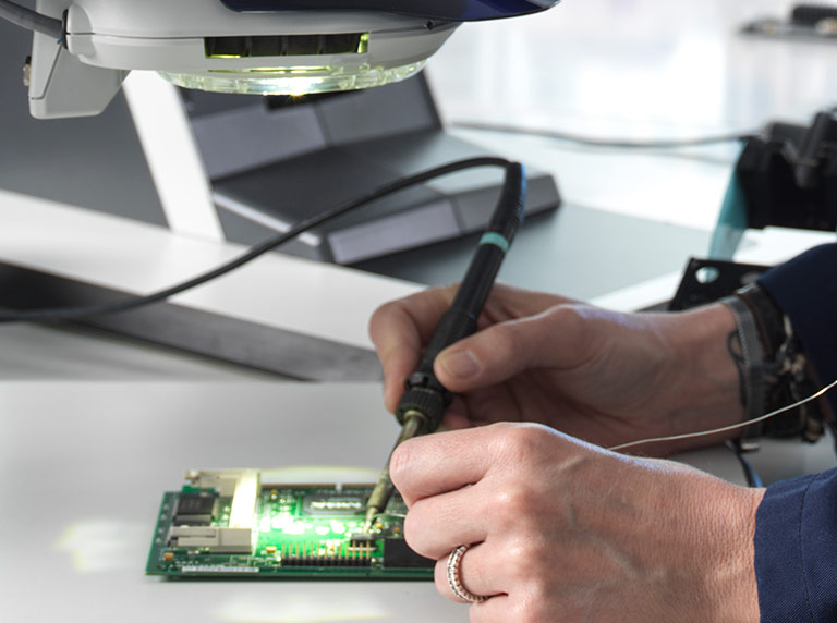 PCB reworking under DRV Stereo CAM digital stereo microscope