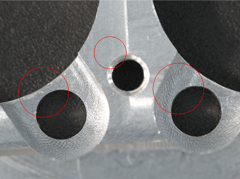 Metal component magnified with Makrolite 4k digital microscope showing defects